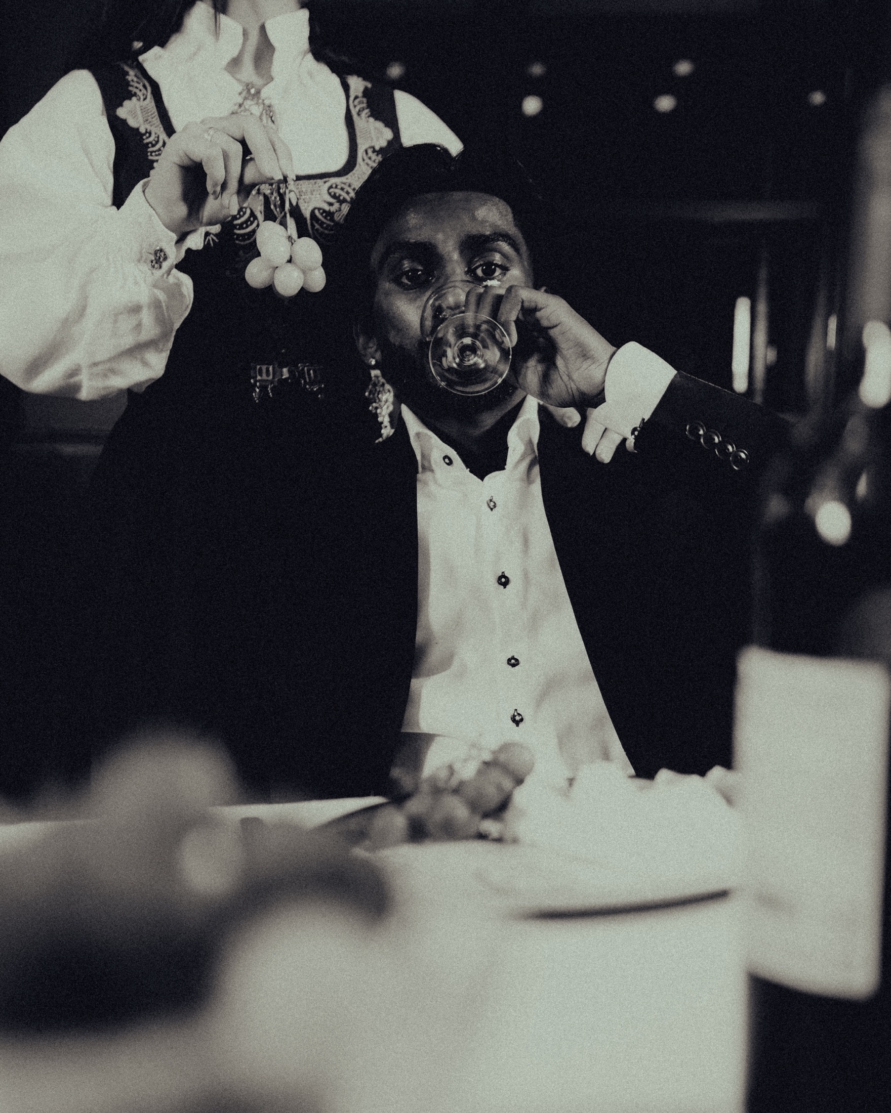Candid celebration photographed in monochrome